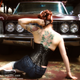Illustration for article titled Girls With Cars: Photographs By Phillip Hall